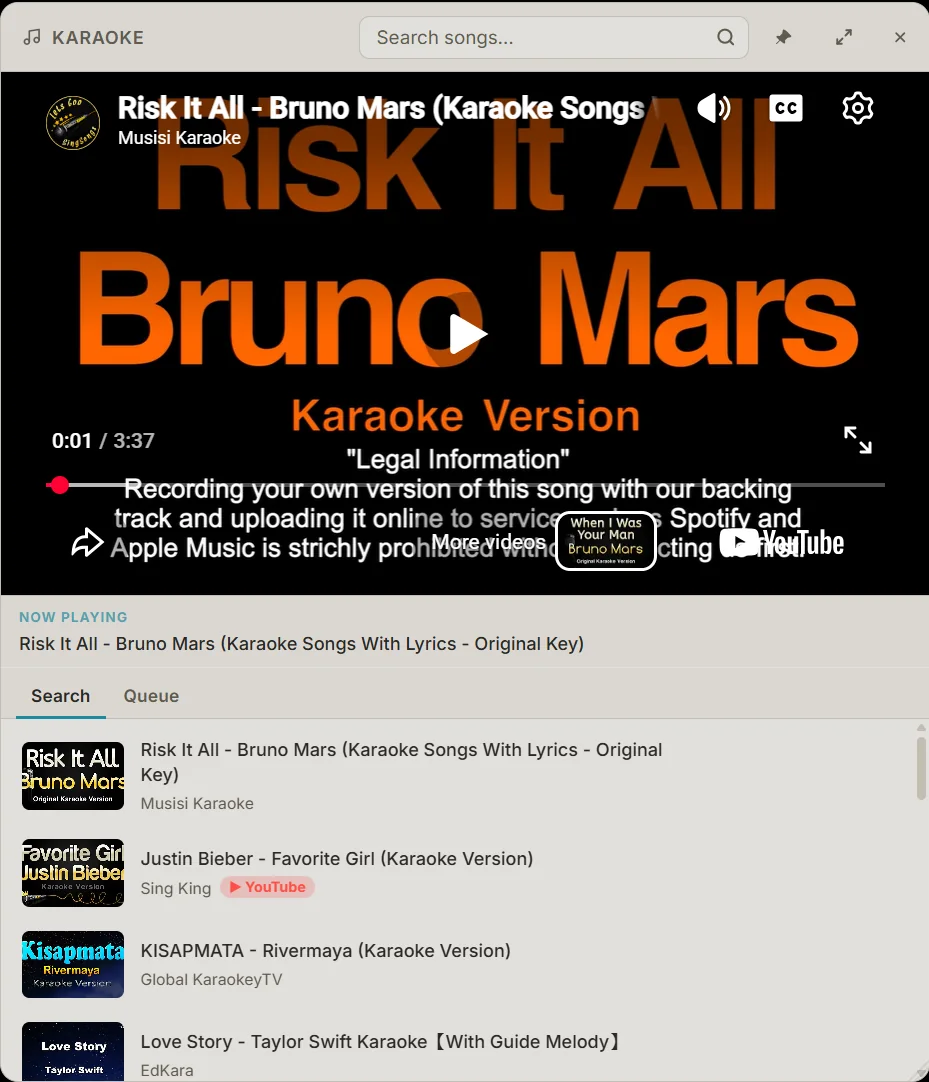 The Karaoke window playing a karaoke video, with Now Playing, a song search and a list of karaoke tracks